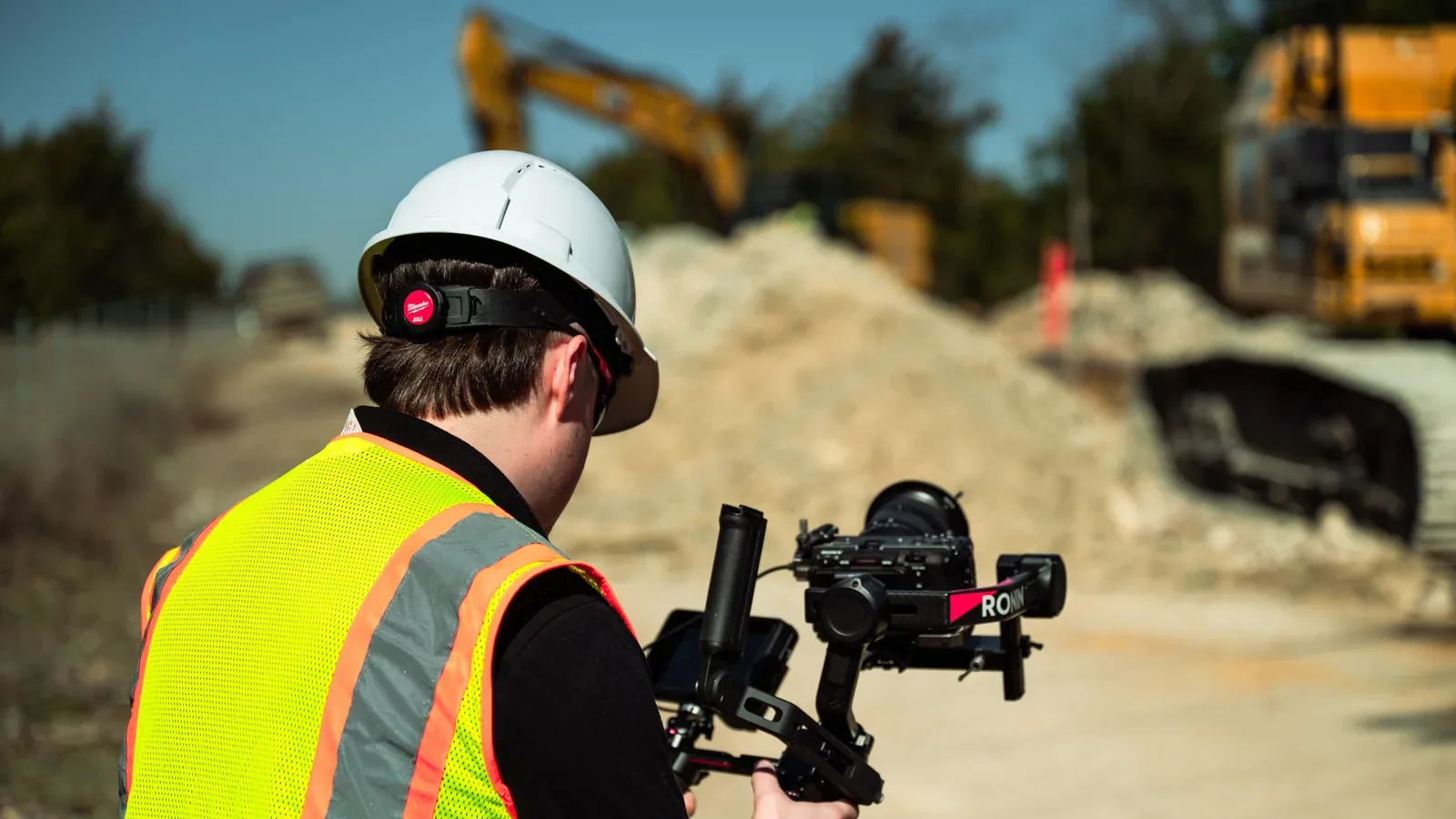 Filming an interview at a construction site, camera on a gimbal