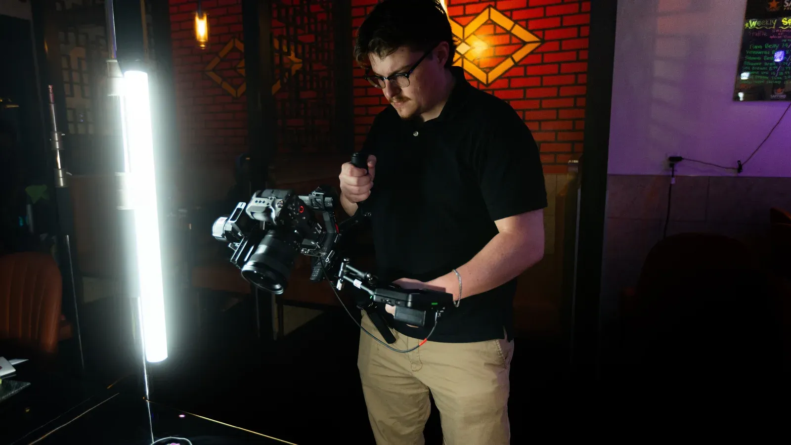 Operating a cinema camera on a lit interior set
