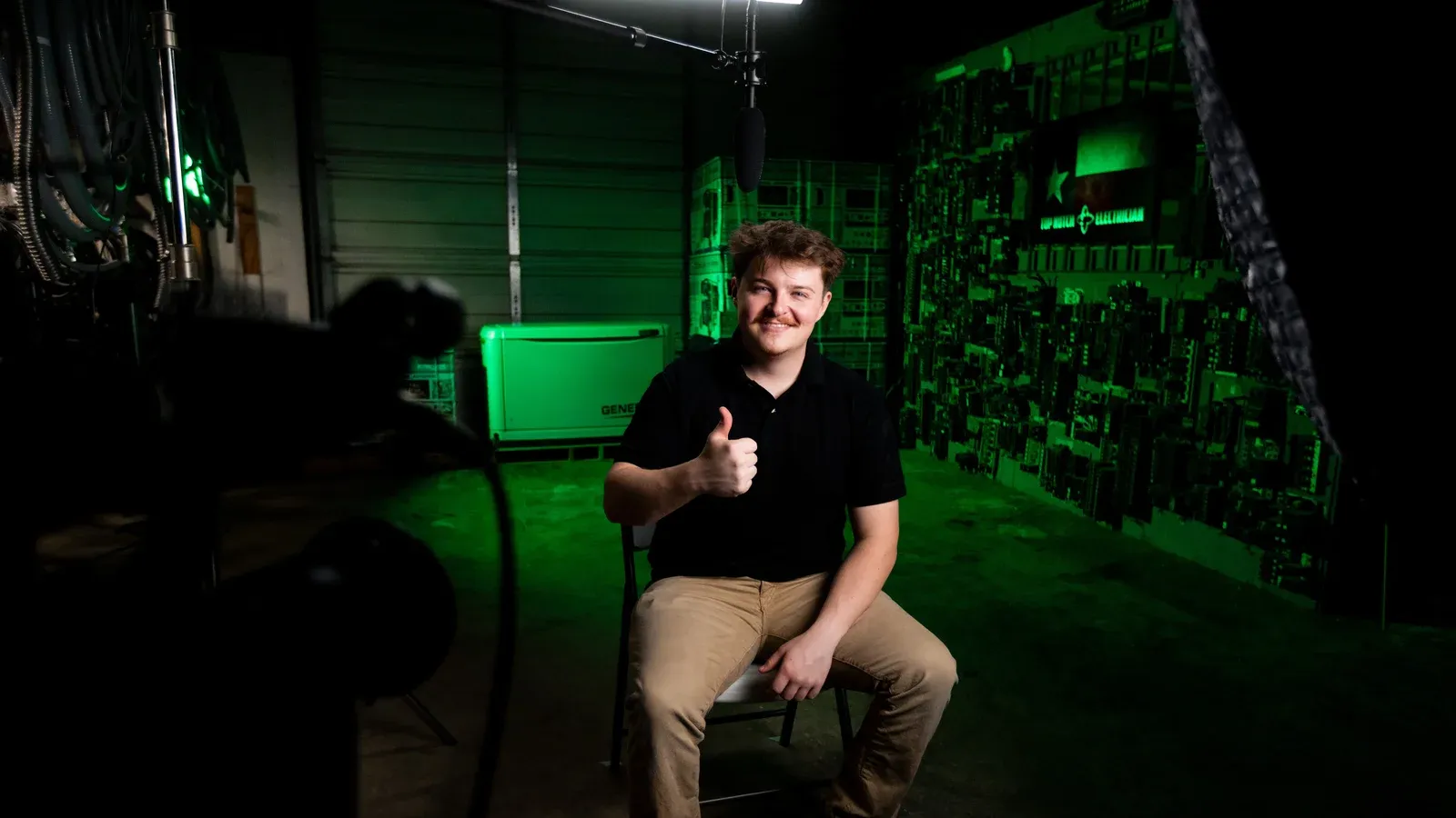 An interview lit inside a gun shop, subject miked and seated