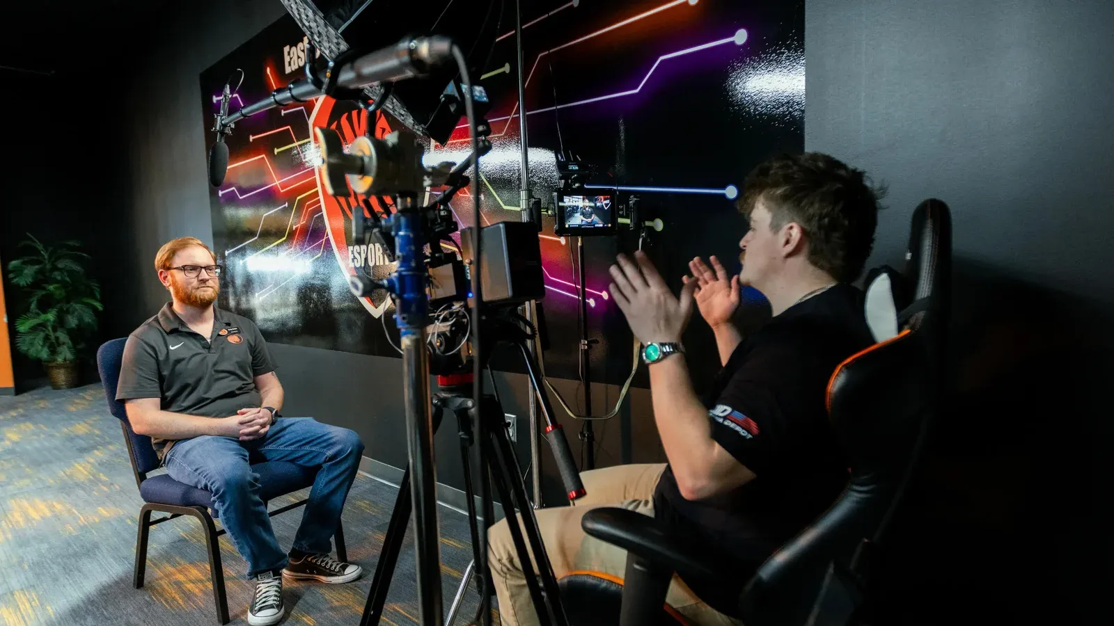 Filming an interview inside a collegiate esports lab